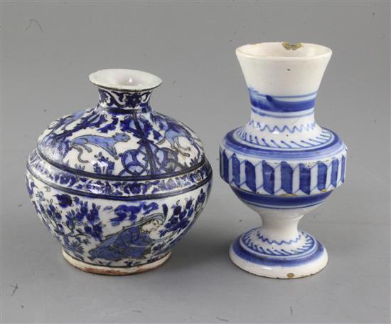 A Safavid underglaze blue and black pottery jar, 17th century, and a tin-glaze pottery vase, height 12.5cm